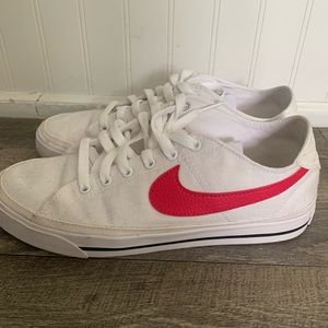 Nike women’s canvas shoes size 9 white and pink.